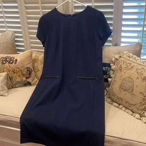 A Classic Dress with leather trimmed pockets!